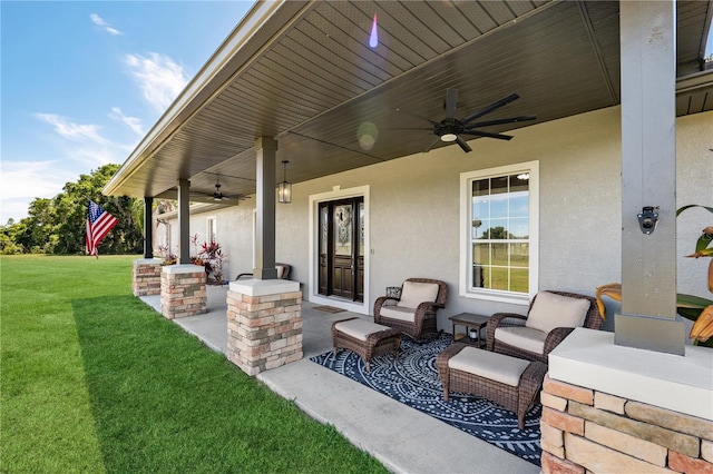 view of patio with ceiling fan