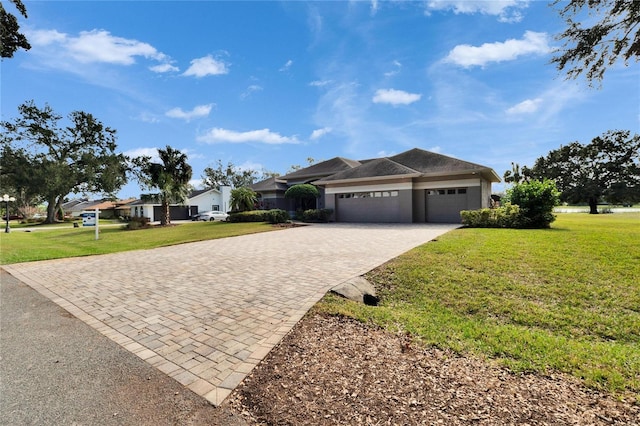 ranch-style home featuring a front yard and a garage