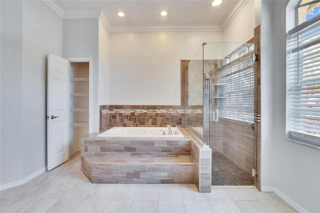 bathroom with ornamental molding, separate shower and tub, and tile patterned flooring