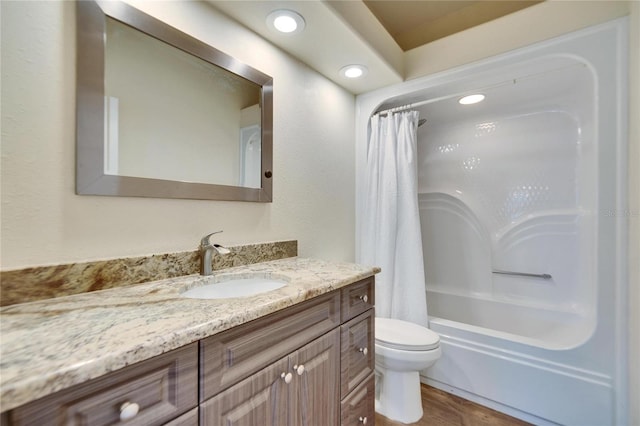 full bathroom with toilet, shower / bathtub combination with curtain, and vanity