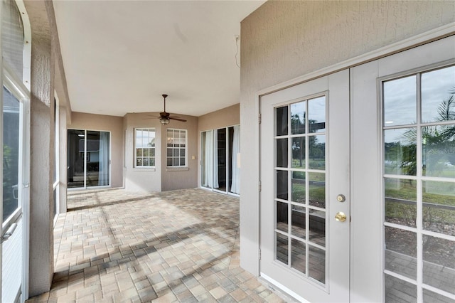 view of patio featuring ceiling fan