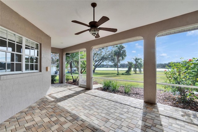 view of patio featuring ceiling fan