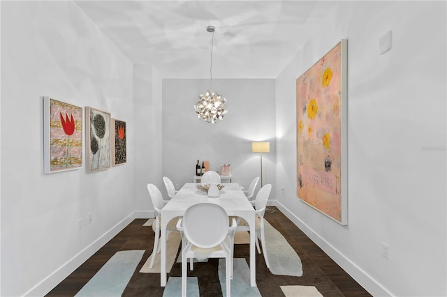 dining area featuring a notable chandelier