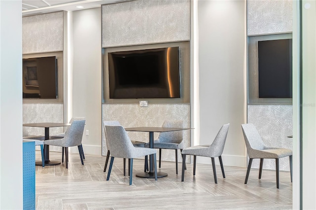 dining area featuring light parquet floors