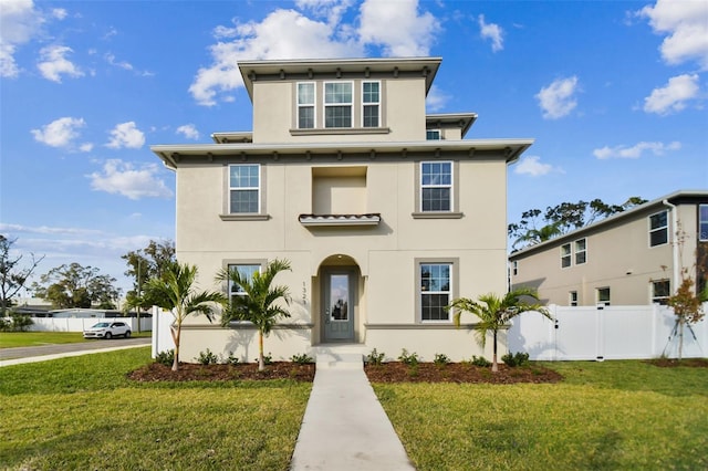 view of front of home featuring a front lawn