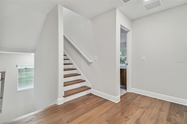 foyer entrance with light hardwood / wood-style flooring