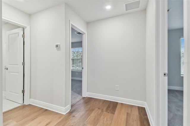 corridor featuring light wood-type flooring