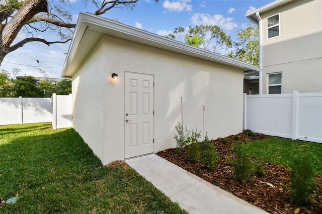 view of outdoor structure featuring a yard