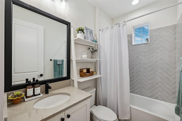 full bathroom with vanity, shower / bath combination with curtain, and toilet