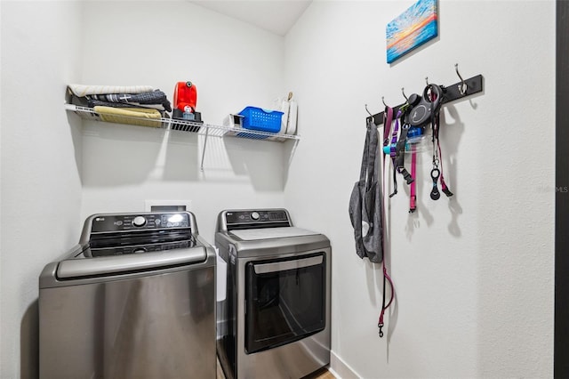 laundry room with washer and clothes dryer