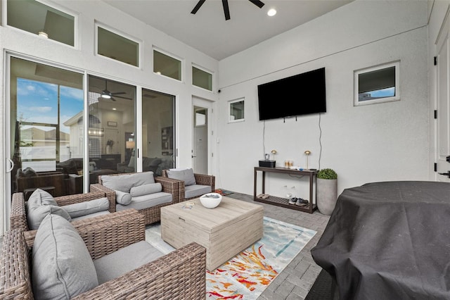 living room featuring ceiling fan