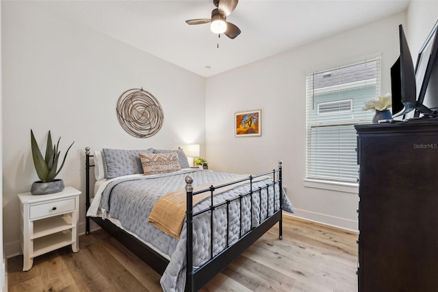 bedroom featuring ceiling fan and light wood-type flooring