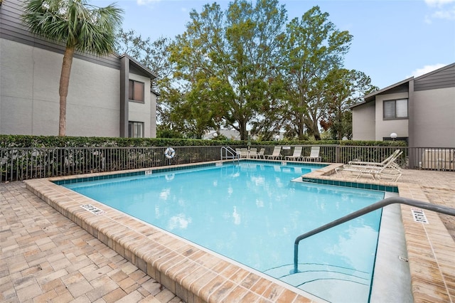 community pool with fence