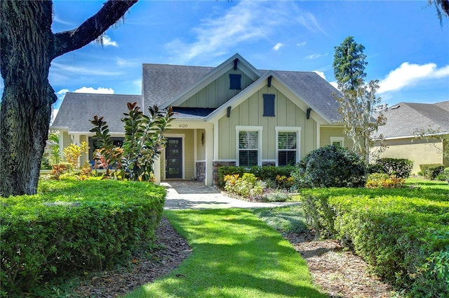 view of front of home with a front lawn