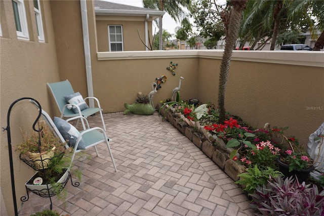 view of patio / terrace with a balcony