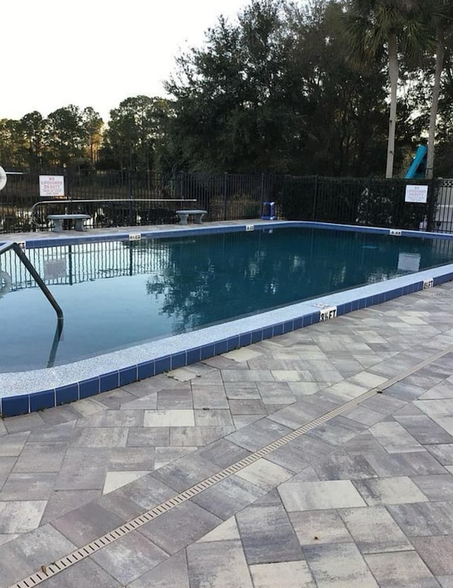 view of pool with a patio area