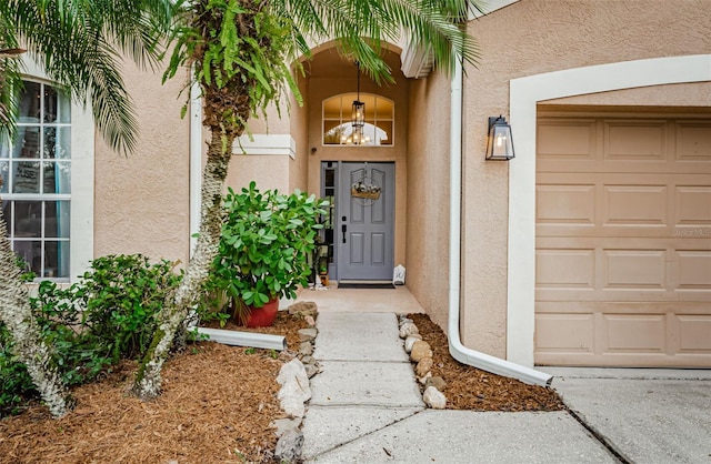 property entrance featuring a garage