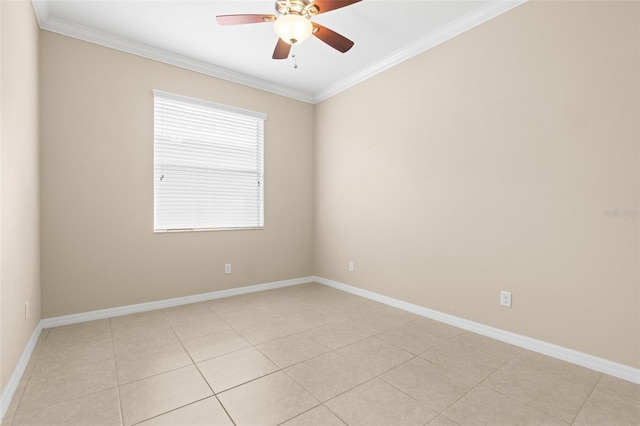 spare room with light tile patterned floors, crown molding, and ceiling fan