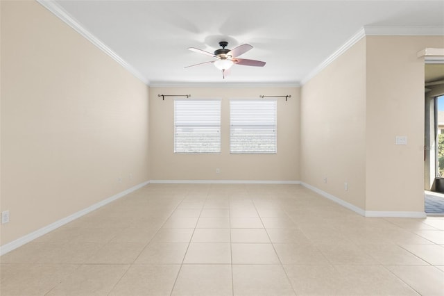 tiled spare room with crown molding, plenty of natural light, and ceiling fan