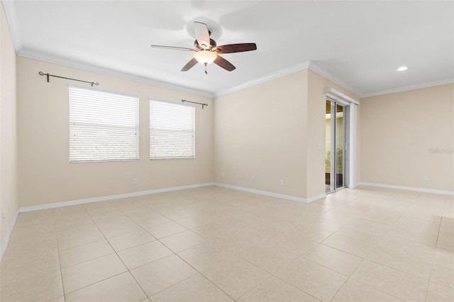 tiled spare room featuring ornamental molding and ceiling fan