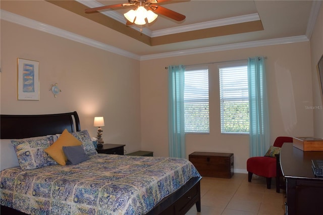 bedroom featuring a raised ceiling, ornamental molding, and light tile patterned floors