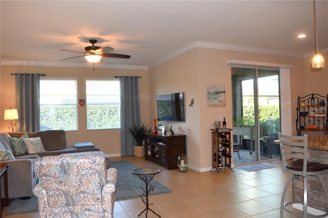 living room with light tile patterned floors, plenty of natural light, and ornamental molding