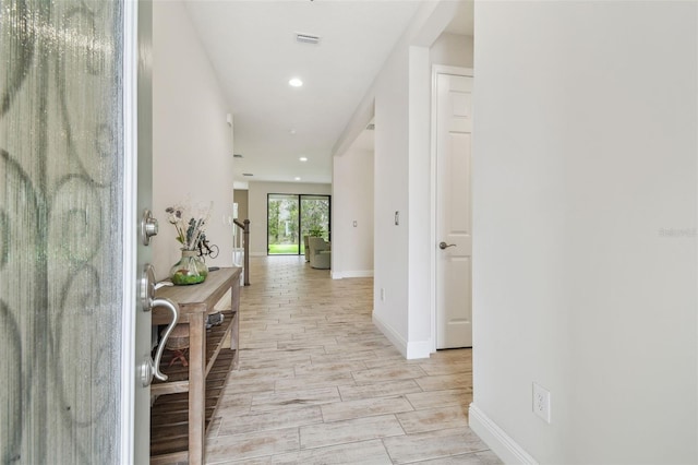 hall featuring light hardwood / wood-style flooring