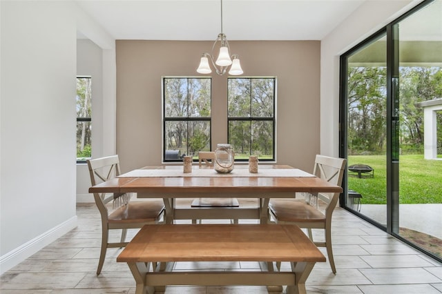 dining room featuring a chandelier