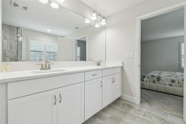 bathroom featuring vanity and walk in shower