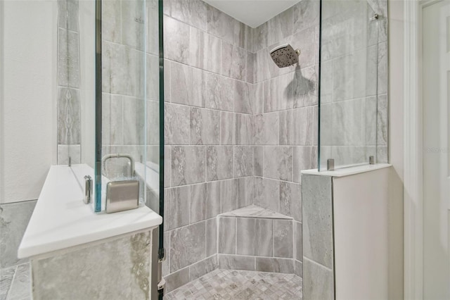 bathroom featuring an enclosed shower