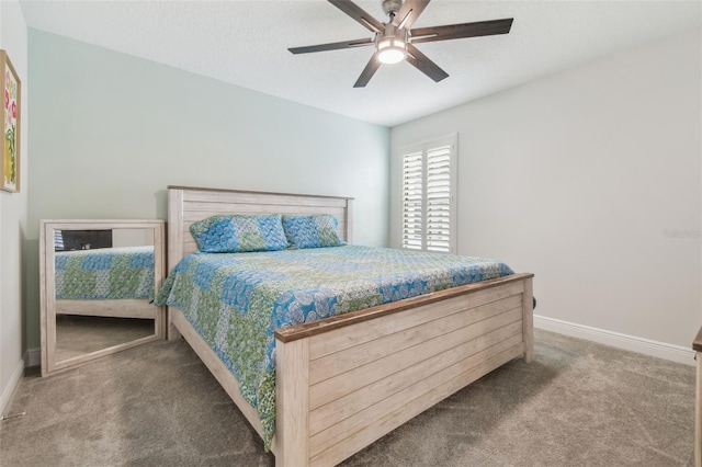 bedroom with ceiling fan and carpet flooring