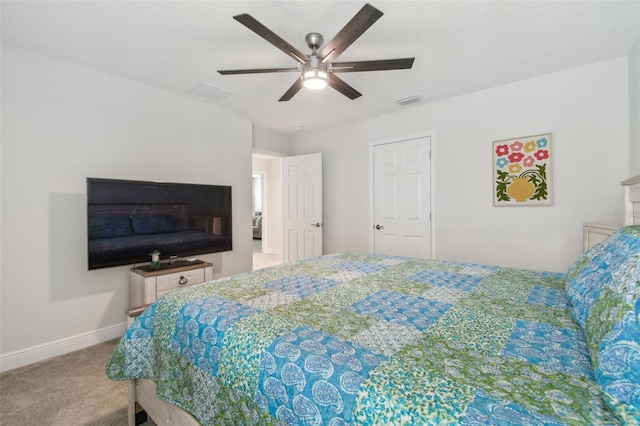 carpeted bedroom featuring ceiling fan