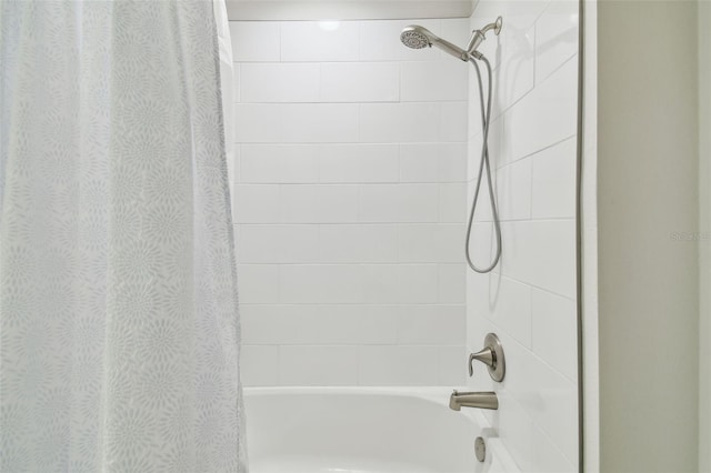 bathroom featuring shower / bath combination with curtain