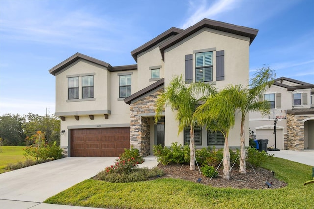 view of front of house featuring a garage and a front yard