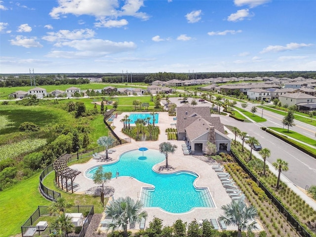 view of swimming pool featuring a patio area