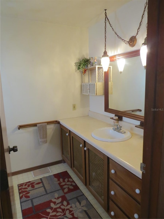 bathroom featuring vanity and tile patterned flooring