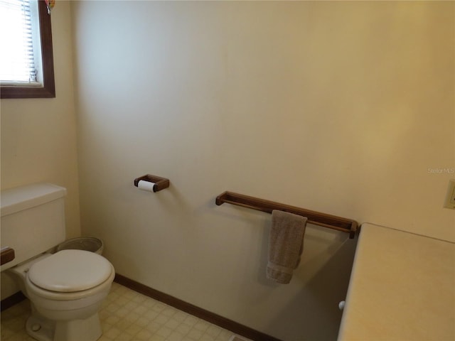 bathroom featuring toilet