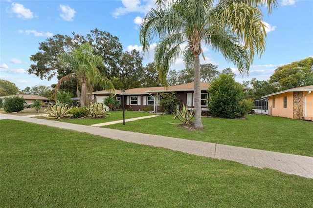 ranch-style house with a front yard