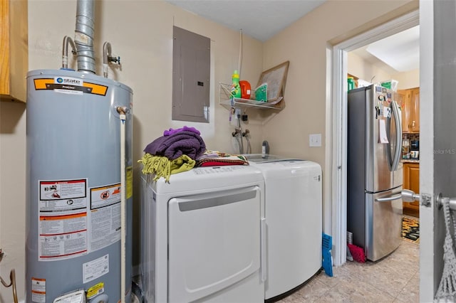 laundry room featuring separate washer and dryer, electric panel, and gas water heater