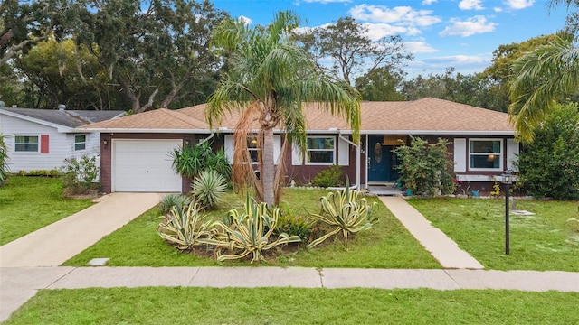 ranch-style home with a front lawn and a garage