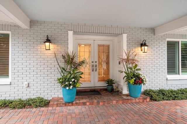 entrance to property featuring french doors