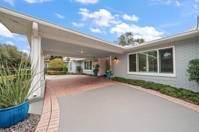 view of patio featuring a carport