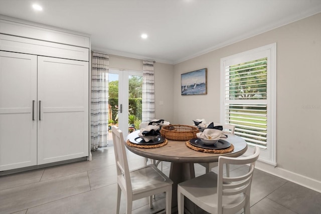 dining area with crown molding