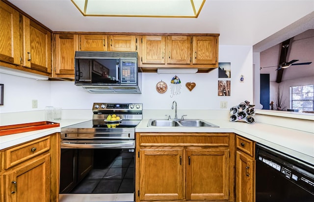 204 Lennox Rd W, W, Palm Harbor, FL 34683 - kitchen featuring sink, tile patterned floors, black appliances, and ceiling fan