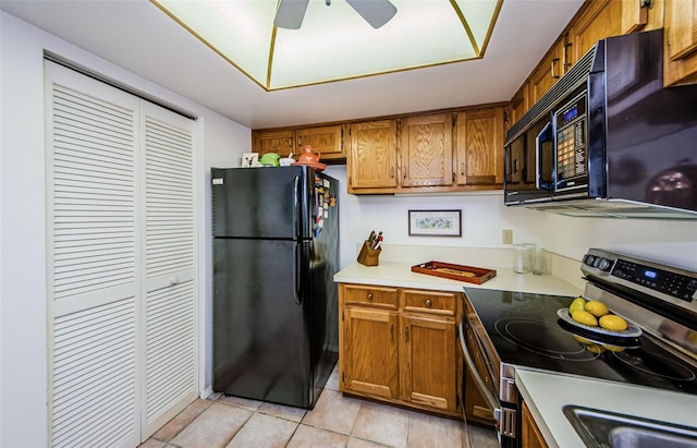 204 Lennox Rd W, W, Palm Harbor, FL 34683 - kitchen featuring ceiling fan, light tile patterned floors, and black appliances
