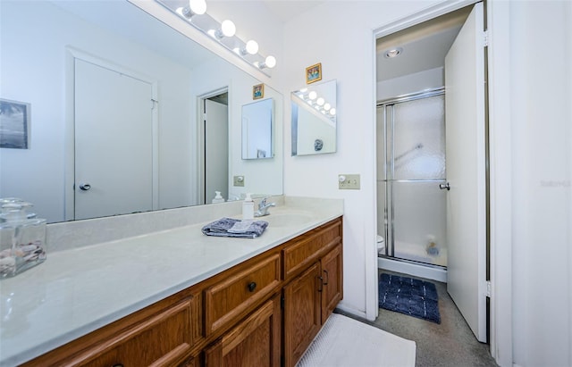 204 Lennox Rd W, W, Palm Harbor, FL 34683 - bathroom featuring a shower with door, vanity, and toilet