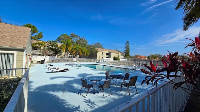 view of swimming pool featuring a patio