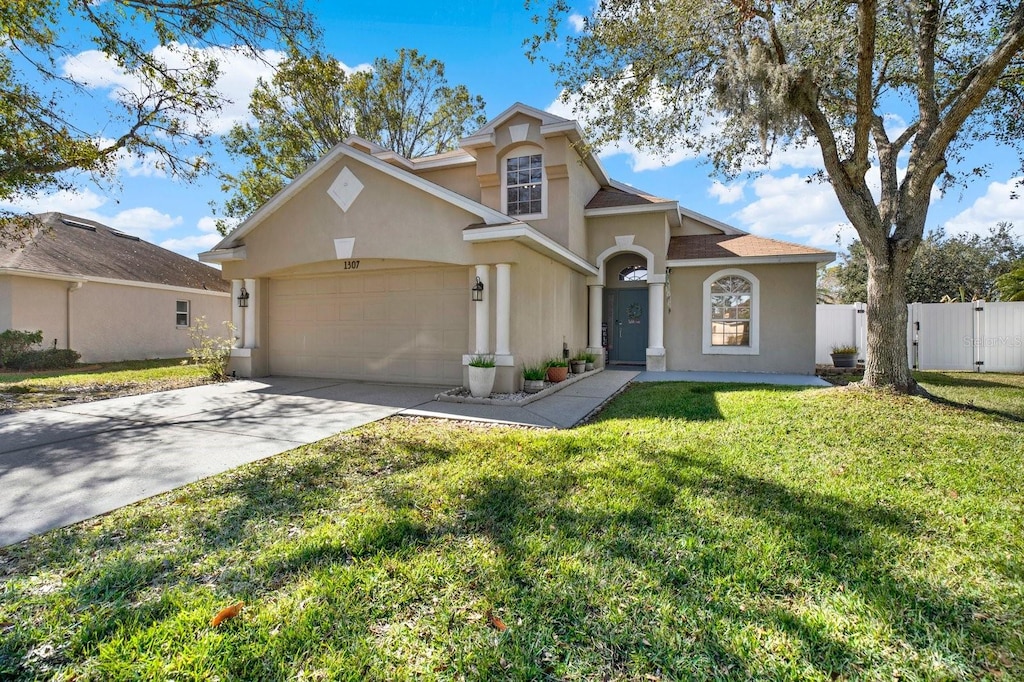 view of property with a front lawn