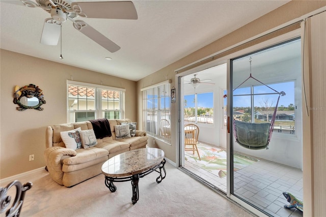 interior space with ceiling fan and a healthy amount of sunlight