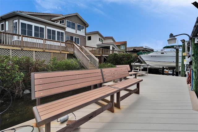 view of dock featuring a wooden deck